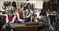 Group at saddler's shop