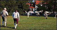 Baseball's origins skip a long and crooked base path back to the Middle Ages, passing through a cricket match in the colonies, played, from left, by Peter Stinely, Frank Megargee, Mike Luzzi, Bill Rose, Cash Arehart, Rick Gilliland; watched by Dennis Watson.