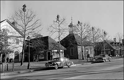 Men trimming trees in Merchants Square, 1956