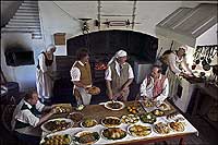 Group setting out a meal