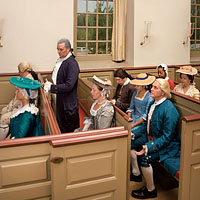 From left, Carolyn Wilson, Robert Weathers, Ron Carnegie as George Washington, Donna Wolf, Jack Flintom, Megan Brown, Jeffrey Villines, Janine Harris, and Kaitlin Kovach