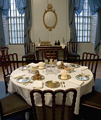 Ice cream, molded to look like a fruit basket, takes pride of place on the dessert table set at the Governor’s Palace.